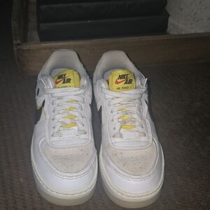 Nike Air Force 1 White, Black, and Yellow Low-Top Sneakers Athletic Style